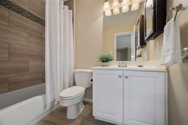 full bathroom featuring vanity, toilet, and shower / tub combo