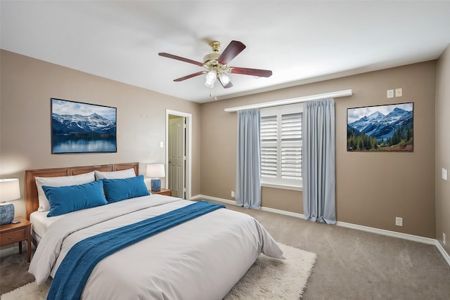 bedroom with light colored carpet and ceiling fan