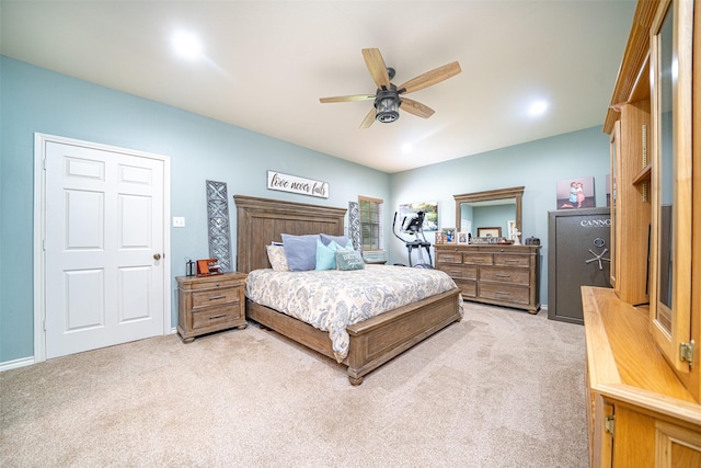 bedroom featuring light colored carpet and ceiling fan