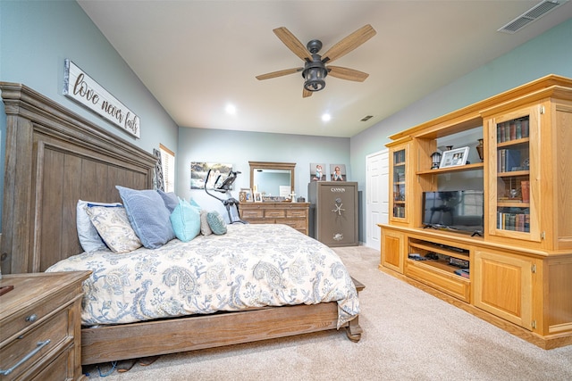 bedroom featuring light colored carpet and ceiling fan