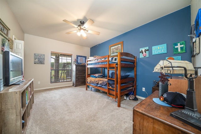 bedroom with light colored carpet and ceiling fan