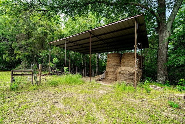 view of parking / parking lot with a carport