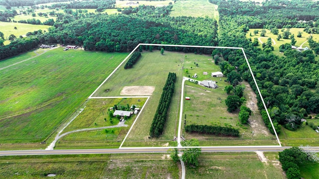 birds eye view of property featuring a rural view