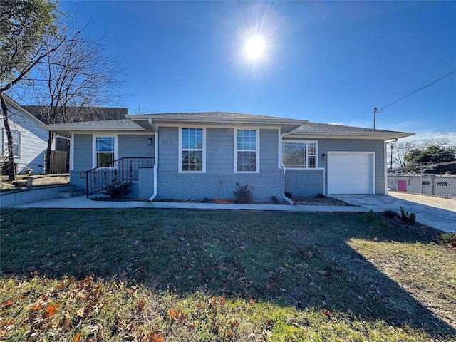 single story home with a front lawn and a garage