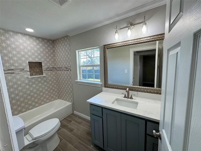 full bathroom featuring shower / bath combination, vanity, a textured ceiling, and toilet