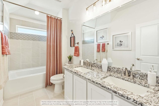 full bathroom featuring tile patterned flooring, vanity, toilet, and shower / bathtub combination with curtain