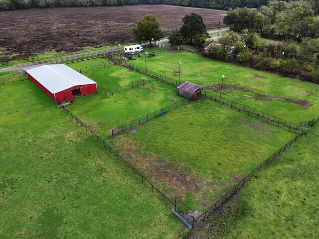 single story home featuring a yard and a garage