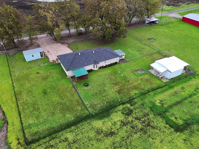 birds eye view of property featuring a rural view