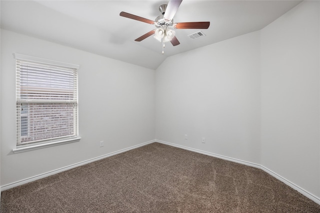 unfurnished room with carpet floors, ceiling fan, and vaulted ceiling