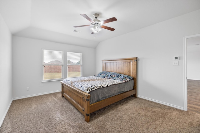 carpeted bedroom with lofted ceiling and ceiling fan