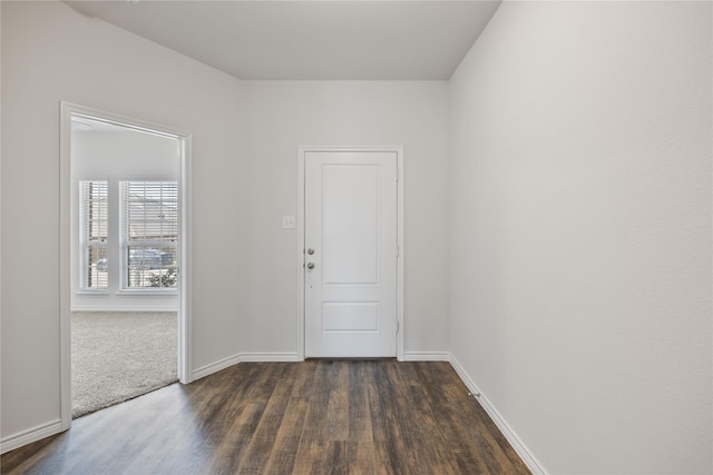 entryway with dark wood-type flooring