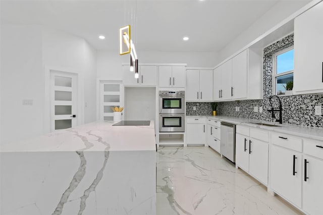 kitchen with decorative backsplash, appliances with stainless steel finishes, marble finish floor, pendant lighting, and a sink