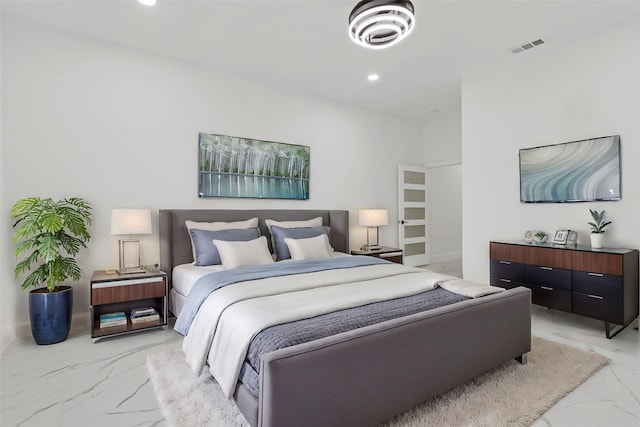 bedroom featuring recessed lighting, marble finish floor, visible vents, and baseboards