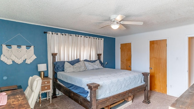 bedroom featuring ceiling fan, carpet, and a textured ceiling