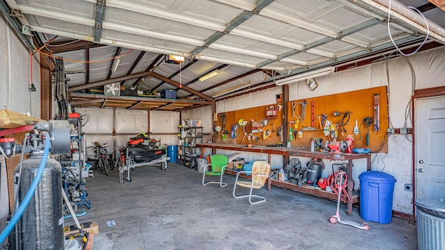 garage featuring a workshop area