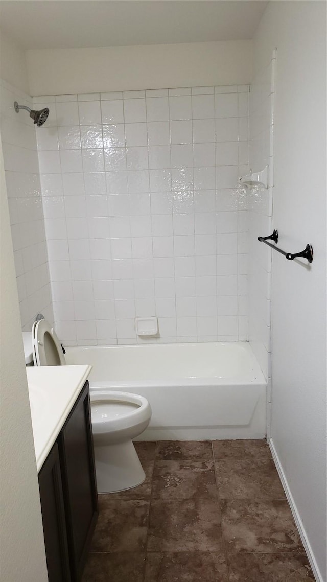 full bathroom with bathtub / shower combination, vanity, and toilet