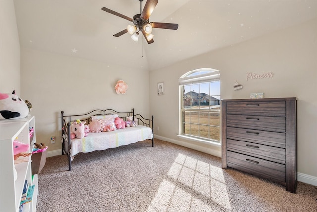 carpeted bedroom with lofted ceiling, ceiling fan, and baseboards