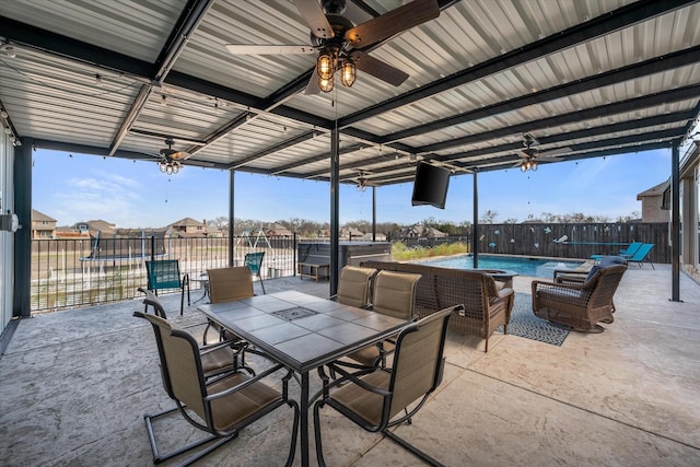 view of patio with a fenced in pool, ceiling fan, a fenced backyard, outdoor dining area, and an outdoor living space