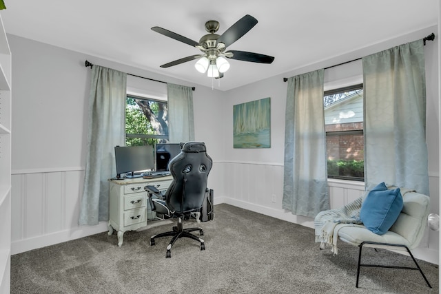 home office featuring carpet floors and ceiling fan