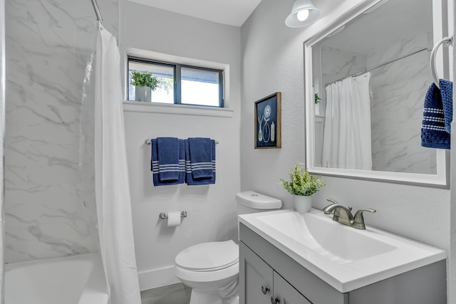 full bathroom featuring vanity, toilet, and shower / bath combo with shower curtain