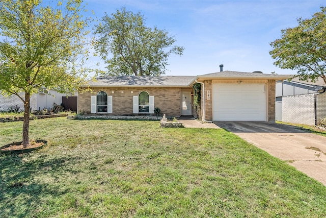 ranch-style house with a garage and a front lawn