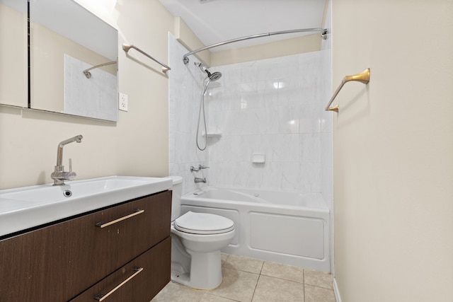 full bathroom featuring tile patterned floors, vanity, tiled shower / bath combo, and toilet