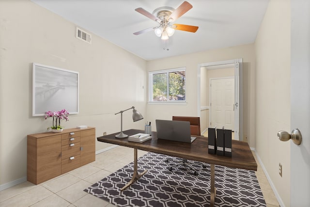 office featuring ceiling fan and light tile patterned floors