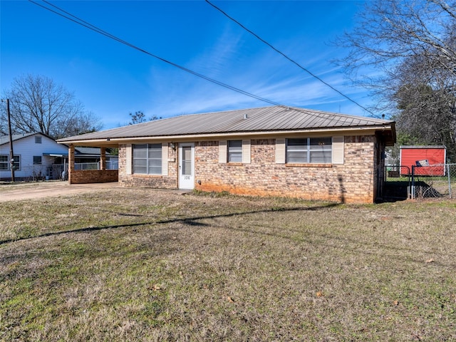 ranch-style house with a front lawn and a carport