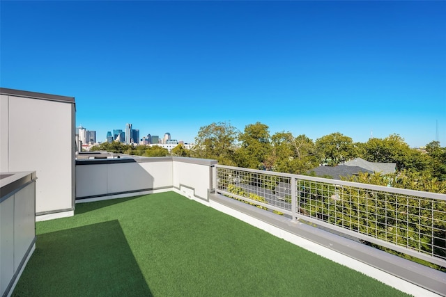 view of yard featuring a balcony