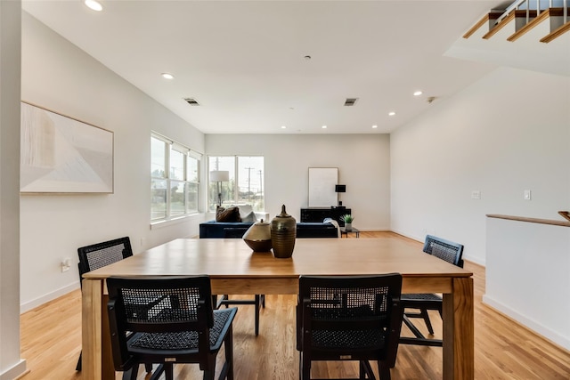 dining area featuring light wood-type flooring