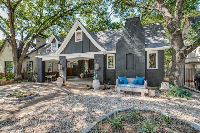 back of house with a porch