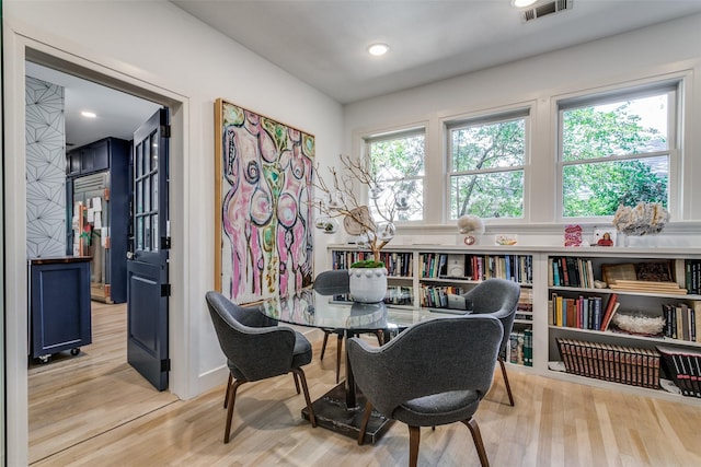 dining room featuring light hardwood / wood-style flooring