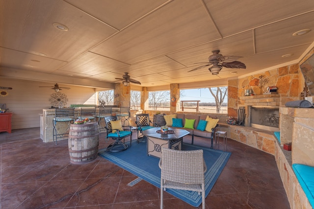 view of patio / terrace featuring an outdoor living space with a fireplace