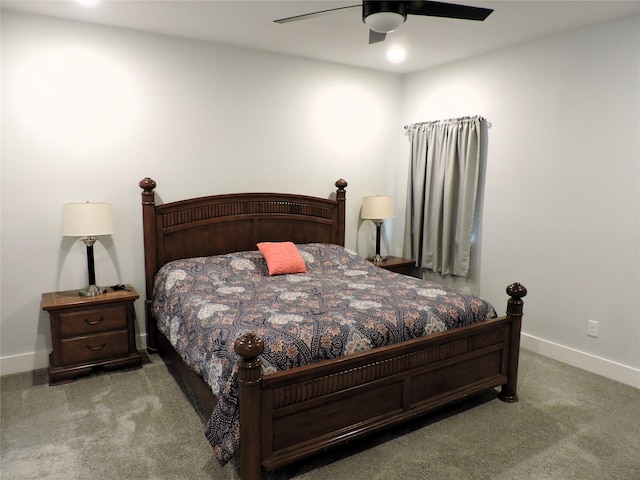 bedroom with light colored carpet and ceiling fan