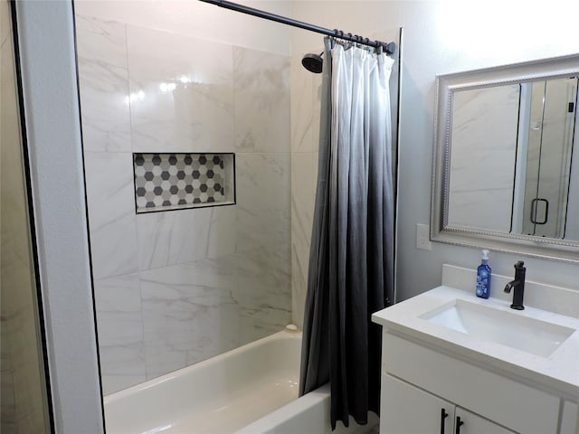 bathroom with shower / bath combo and vanity