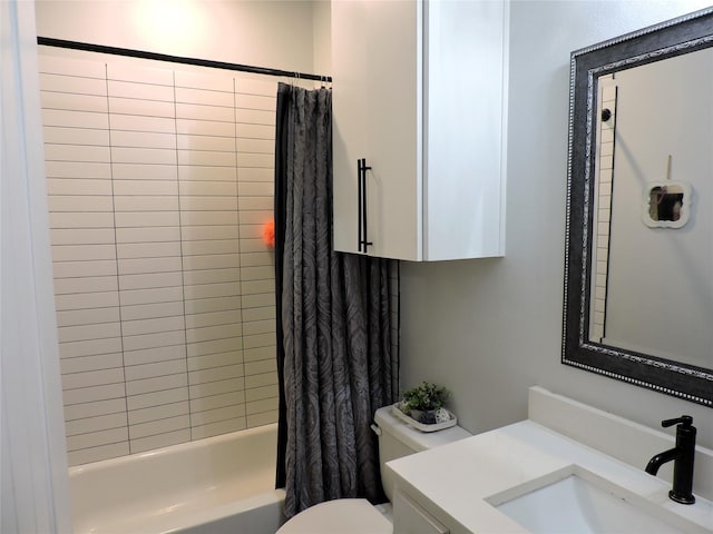 full bathroom featuring shower / bath combination with curtain, vanity, and toilet