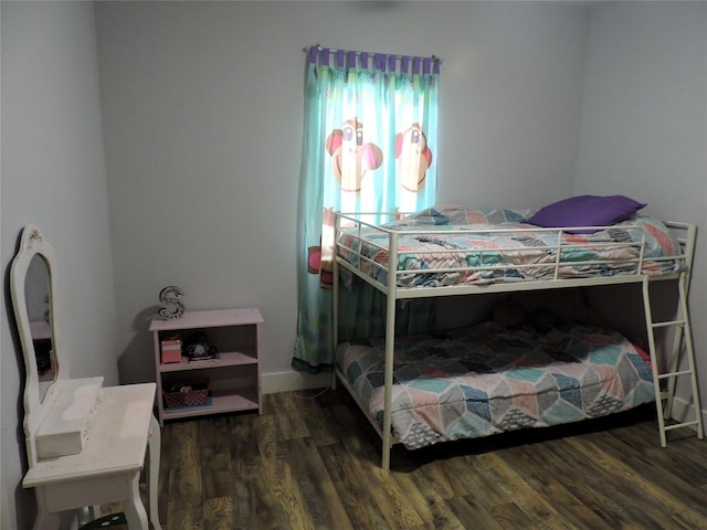 bedroom featuring dark hardwood / wood-style floors