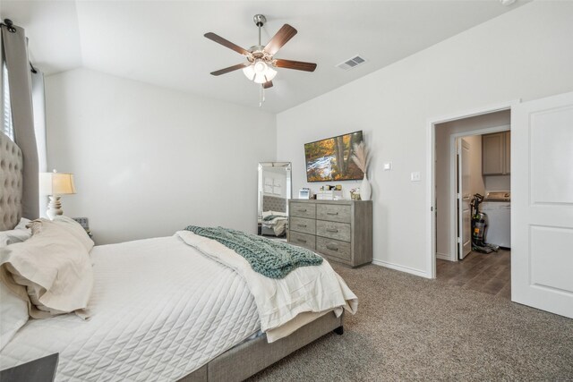 carpeted bedroom featuring ceiling fan, a spacious closet, and vaulted ceiling