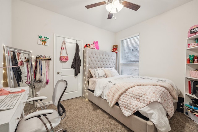 carpeted bedroom with a closet and ceiling fan