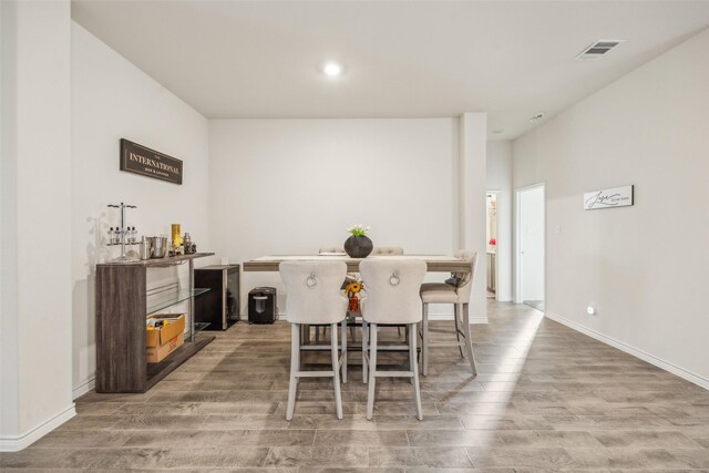 dining room with indoor bar