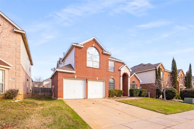 view of front property with a garage and a front lawn