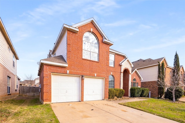 view of front property with a front yard and a garage