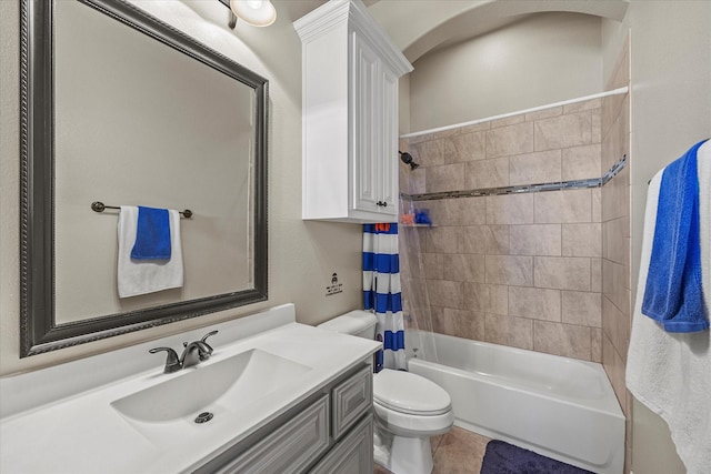 full bathroom featuring vanity, toilet, and shower / bath combo with shower curtain