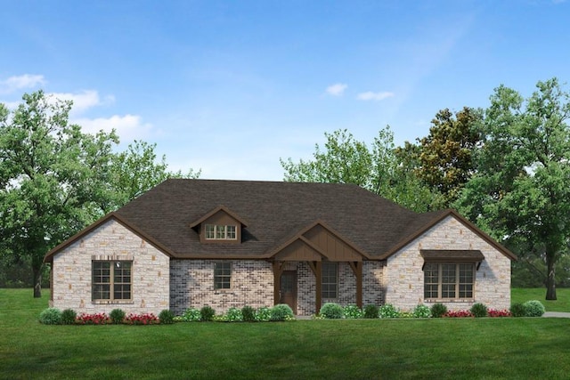 view of front of home featuring a front yard, brick siding, and roof with shingles