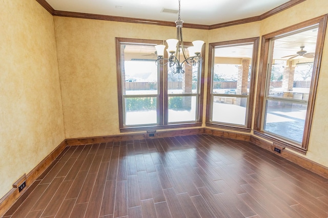 unfurnished room with ornamental molding, wood tiled floor, a healthy amount of sunlight, and baseboards