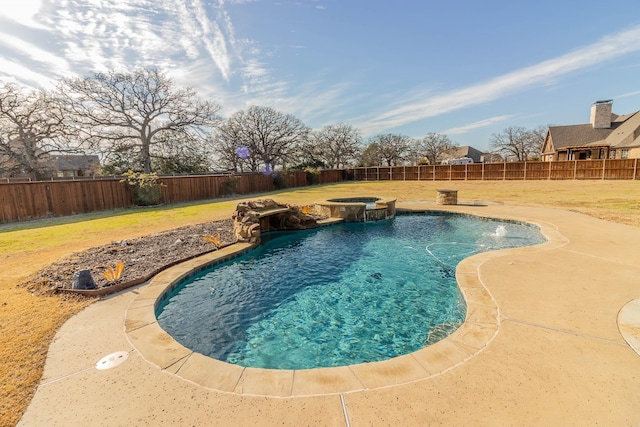 view of swimming pool featuring a fenced backyard and a lawn