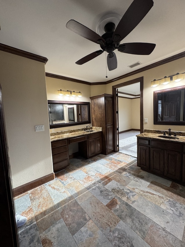 bathroom with vanity, crown molding, and ceiling fan