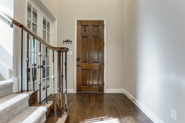 foyer featuring dark wood-type flooring