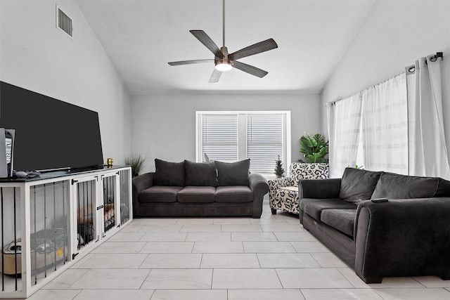 living room with ceiling fan and lofted ceiling