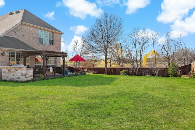 view of yard with a patio area and a pergola